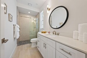 Hair dryer, towels, soap, shampoo