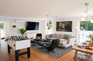 Smart TV, table football, books, music library
