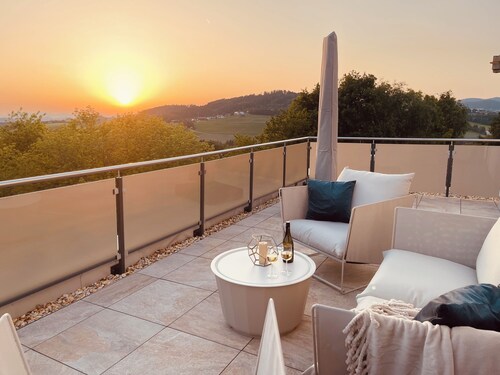 Modern penthouse with whirlpool, mountain views, home cinema and table football