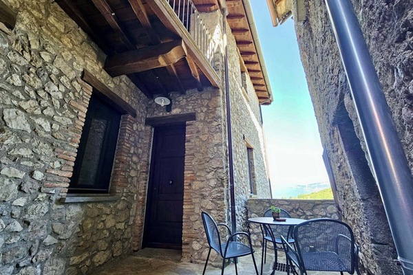 Habitación triple, vista a la montaña | Terraza o patio