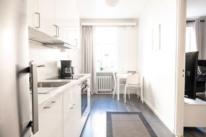 Departamento Confort | Cocina privada | Cafetera y tetera, tetera eléctrica y tostadora 