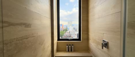 Standard Room, 1 King Bed | Bathroom | Shower, rainfall showerhead, hair dryer, towels