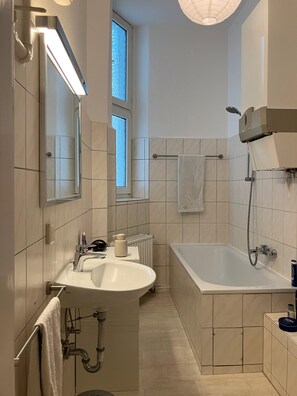 Shower, hair dryer, towels