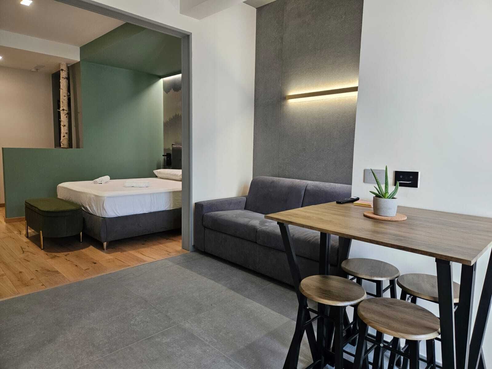 Suite Studio Familiale, patio, vue jardin | Coin séjour