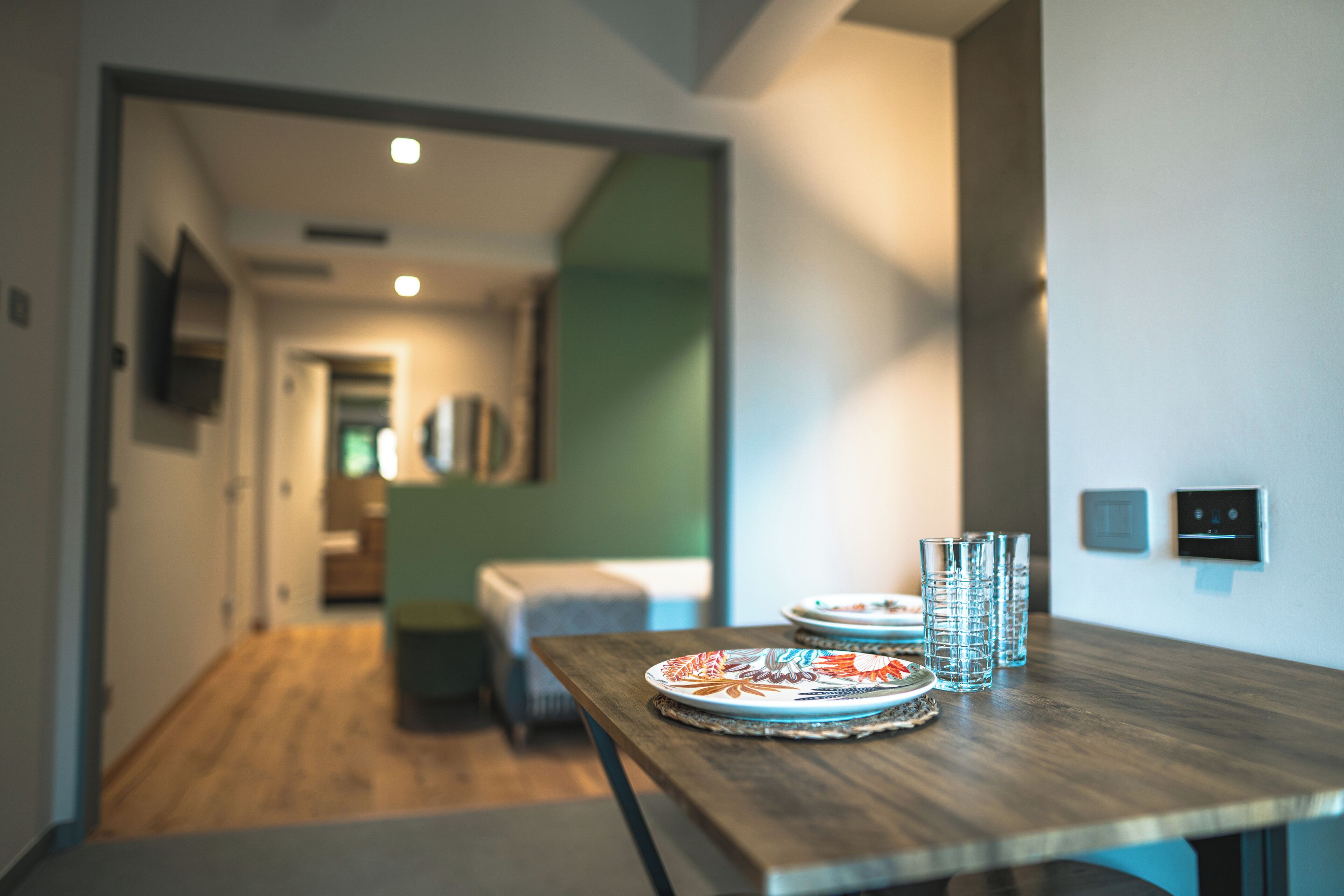 Suite estudio familiar, patio, vista al jardín | Área de sala de estar