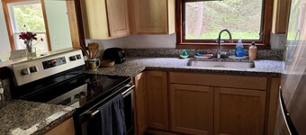 Charming cabin,Lake access, Serene setting! Backyard bubbling brook!Pets welcome