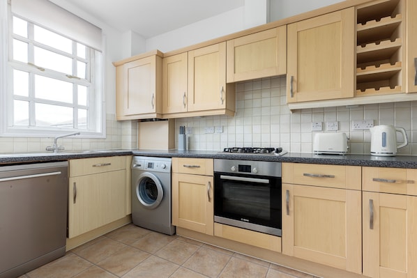 Apartment | Private kitchen | Full-size fridge, microwave, oven, stovetop