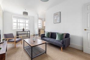 Apartment | Living area | 32-inch flat-screen TV with cable channels, Netflix, streaming services