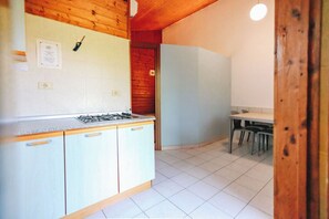 Fridge, highchair, cookware/dishes/utensils