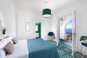 Casa | 1 dormitorio y tabla de planchar con plancha