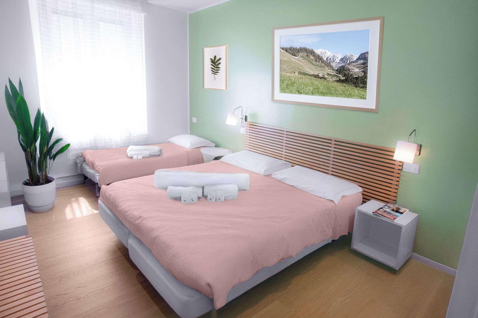 A hotel room with two beds, a potted plant, a framed picture, and a bedside table with a lamp.