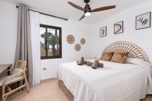 1 bedroom, desk, bed sheets