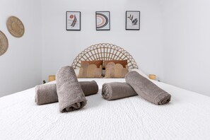 1 bedroom, desk, bed sheets