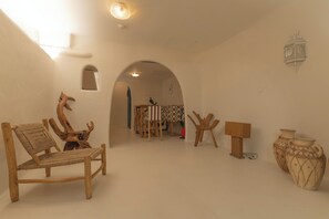 Superior suite, uitzicht op tuin | Woonruimte