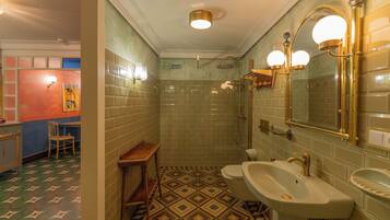 Superior Suite, Garden View | Bathroom | Separate tub and shower, hair dryer, slippers, towels