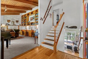 Smart TV, fireplace, books, printers