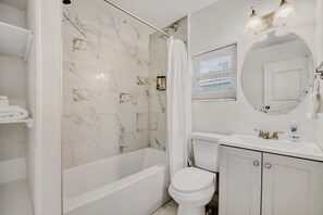 Hair dryer, towels, soap, shampoo