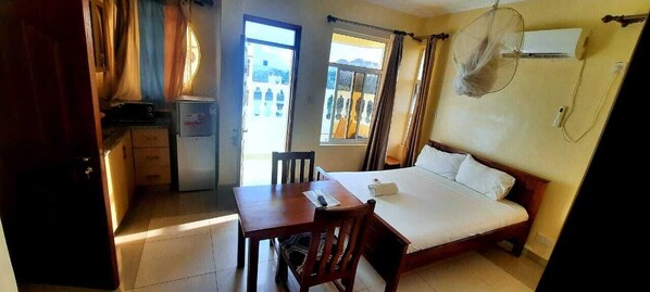 Luxury Studio Suite, Beach View | Iron/ironing board, free WiFi