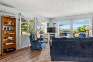 TV, fireplace, books, offices