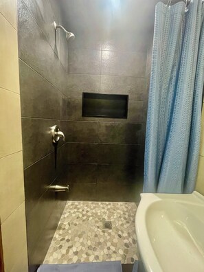 Hair dryer, towels, soap, toilet paper