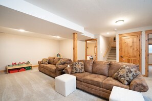 Smart TV, DVD player, foosball, video library
