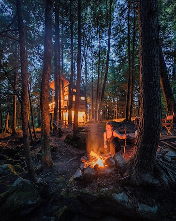 Property grounds. Streamside treehouse in the Vermont forest with access to sauna