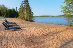 Sun loungers, beach towels - The Luxurious Lakefront Reset on Porters Lake with private beach and hot tub! (Middle Porters Lake)