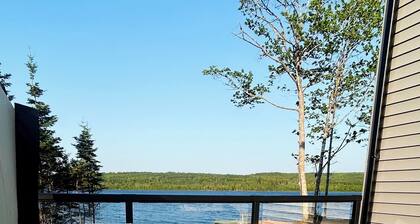 The Luxurious Lakefront Reset on Porters Lake with private beach and hot tub!