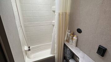 Hair dryer, towels, soap, shampoo