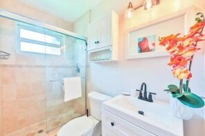 Hair dryer, towels, soap, shampoo