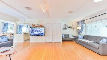 Smart TV, fireplace, foosball, books