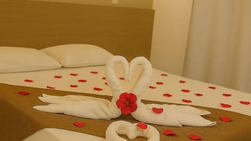 Suite, Balcony, City View | Desk, laptop workspace, blackout drapes, iron/ironing board