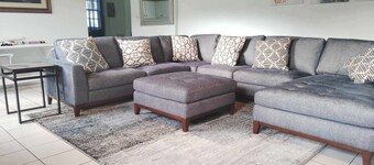 Experience a spacious three-bedroom, two-bathroom villa on the lush Northside.