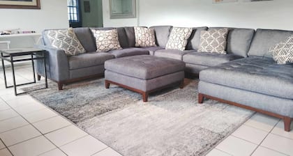 Experience a spacious three-bedroom, two-bathroom villa on the lush Northside.