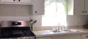 Experience a spacious three-bedroom, two-bathroom villa on the lush Northside.