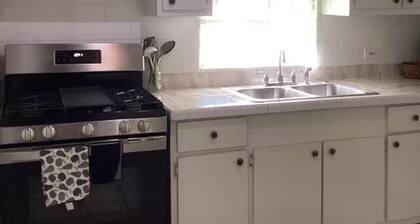 Experience a spacious three-bedroom, two-bathroom villa on the lush Northside.