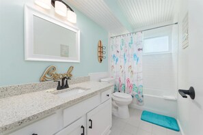 Hair dryer, towels, soap, toilet paper