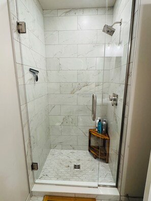 Shower, hair dryer, towels, soap