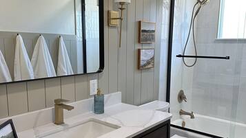 Hair dryer, towels, soap, toilet paper