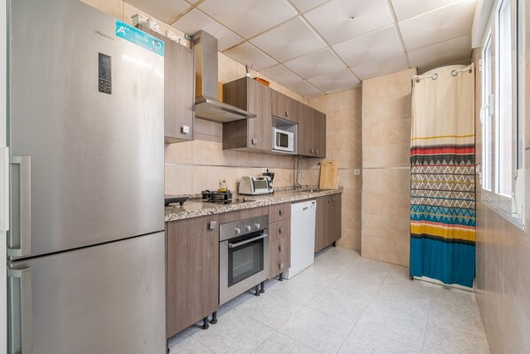 Fridge, microwave, oven, stovetop