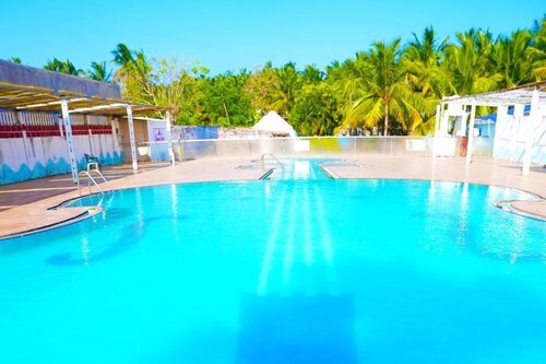 AVM Paalm Meadows Resort Deluxe Room