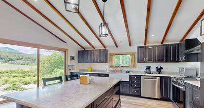 Riverfront house w/ valley & distant mountain views, fireplace, w/d, wifi