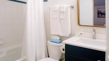 Standard Condo, Multiple Beds, Non Smoking, Balcony | Bathroom | Combined shower/tub, hair dryer, towels, soap