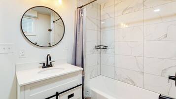 Hair dryer, towels, soap, shampoo