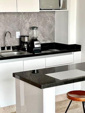 Fridge, microwave, coffee/tea maker, toaster