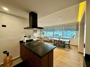 Fridge, microwave, stovetop, coffee/tea maker