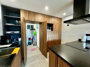 Fridge, microwave, stovetop, coffee/tea maker