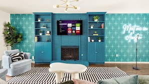 Smart TV, chimenea, videojuegos y futbolito