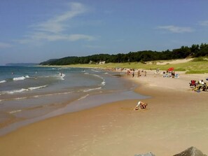 On the beach, sun loungers, beach towels