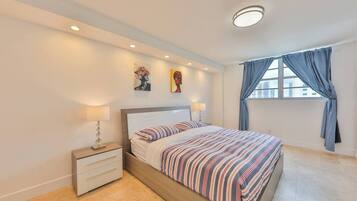 2 bedrooms, desk, iron/ironing board, travel crib